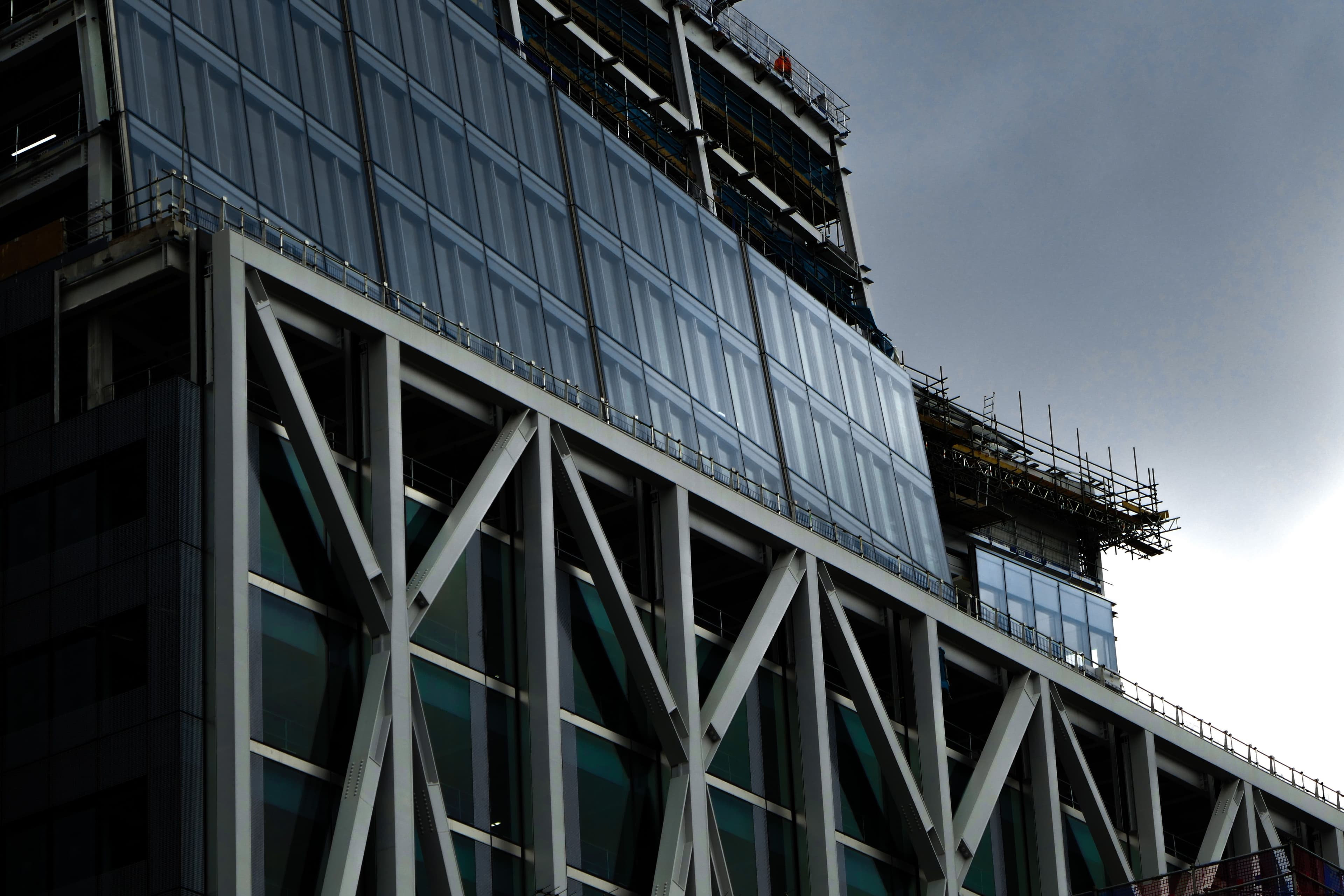 Modern building under construction with exposed structural steel