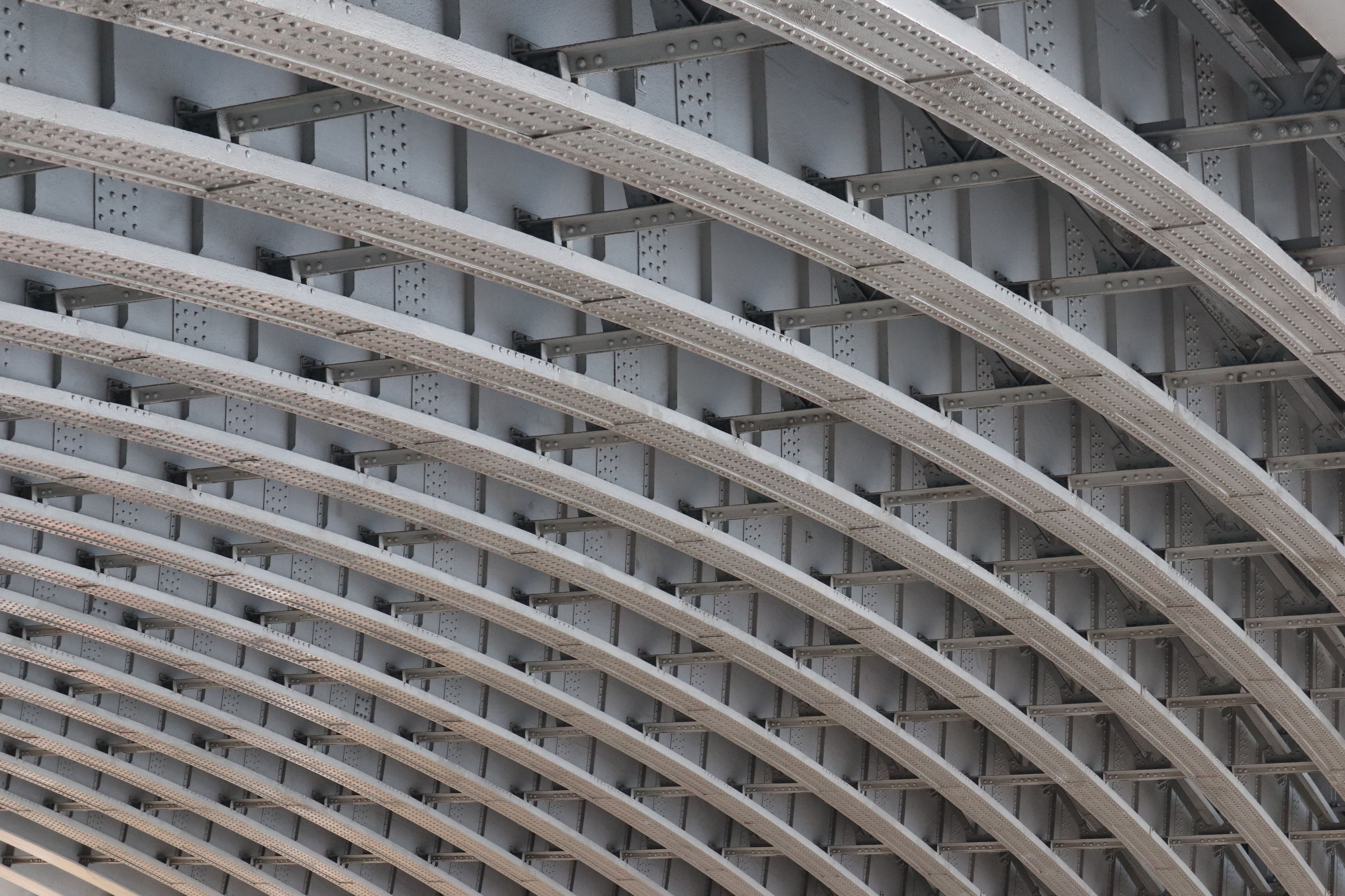 Close-up of curved steel structural framing