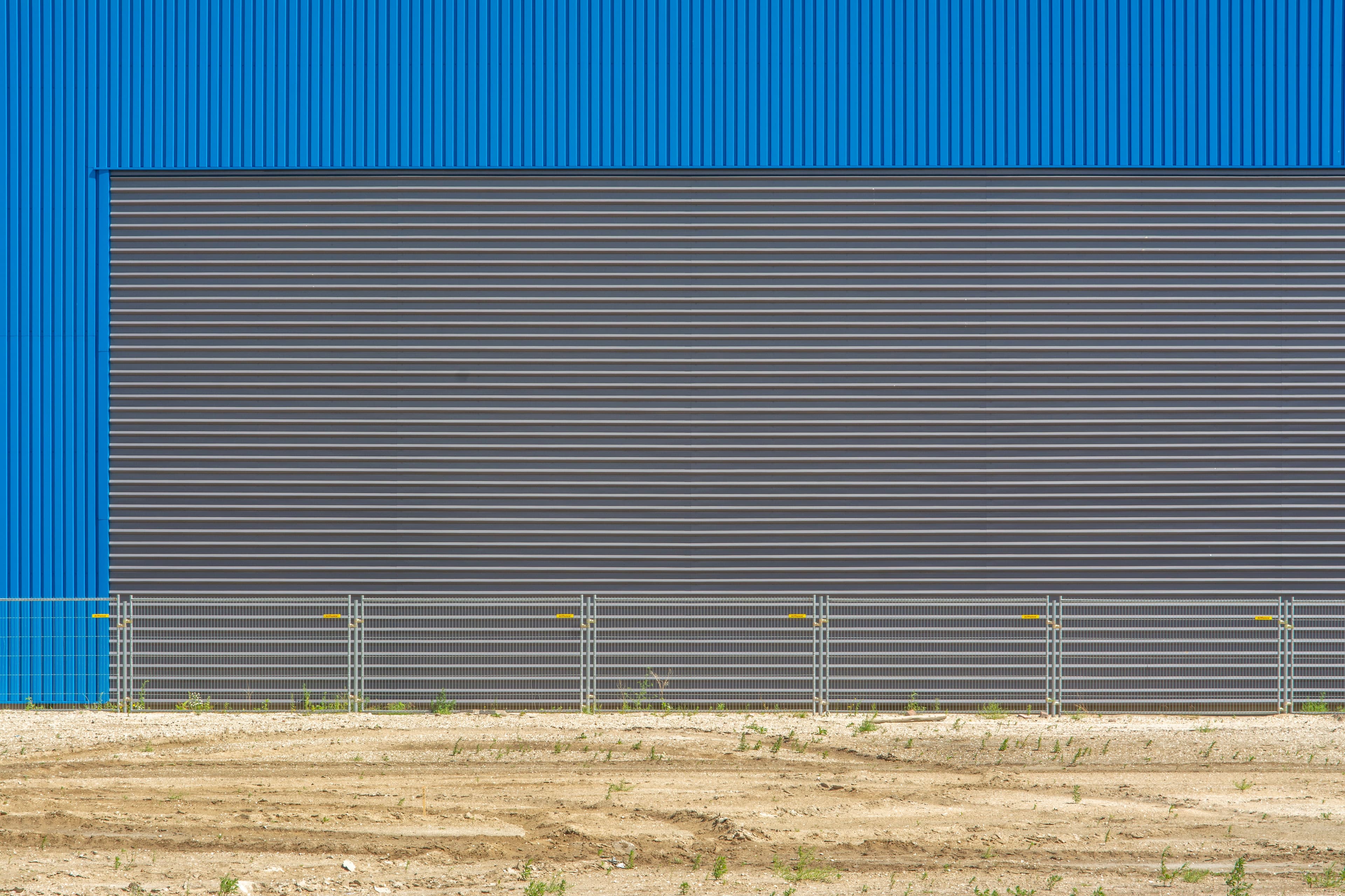 Modern industrial building facade with corrugated steel cladding