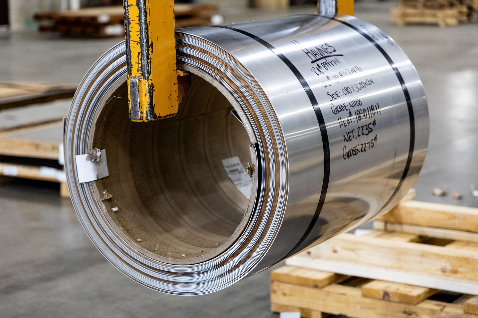 Close-up of a hot rolled steel coil in a warehouse
